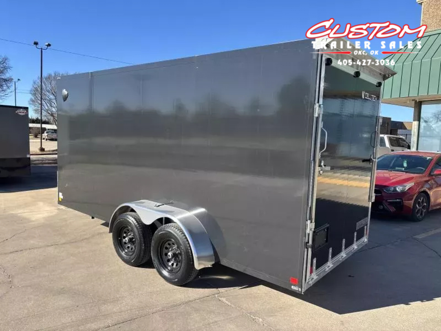 New #002085 2026 CELL TECH TA3 7 X 16 TANDEM AXLE ALL STEEL ENCLOSED W/ REAR RAMP DOOR