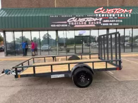 New #144290 2026 LAMAR UC 12 X 77 SINGLE AXLE PIPE TOP 3K UTILITY TRAILER W/ REAR RAMP GATE