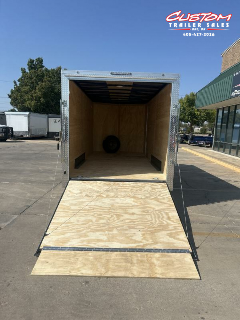 New RENTAL #16 - 7 X 16 TANDEM AXLE 10K ENCLOSED W/ REAR RAMP DOOR