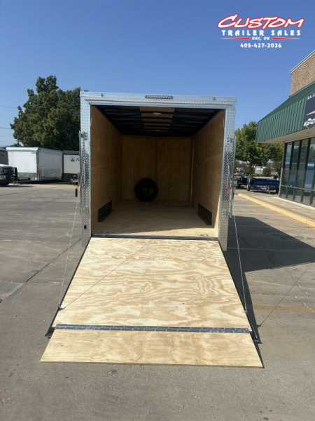 New RENTAL #16 - 7 X 16 TANDEM AXLE 10K ENCLOSED W/ REAR RAMP DOOR