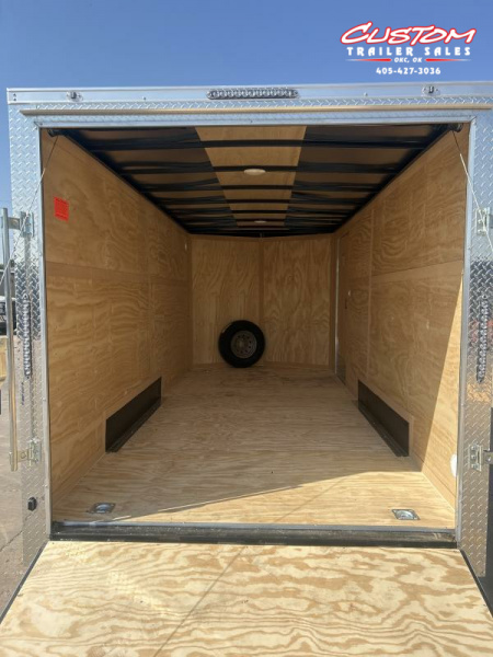 New RENTAL #16 - 7 X 16 TANDEM AXLE 10K ENCLOSED W/ REAR RAMP DOOR