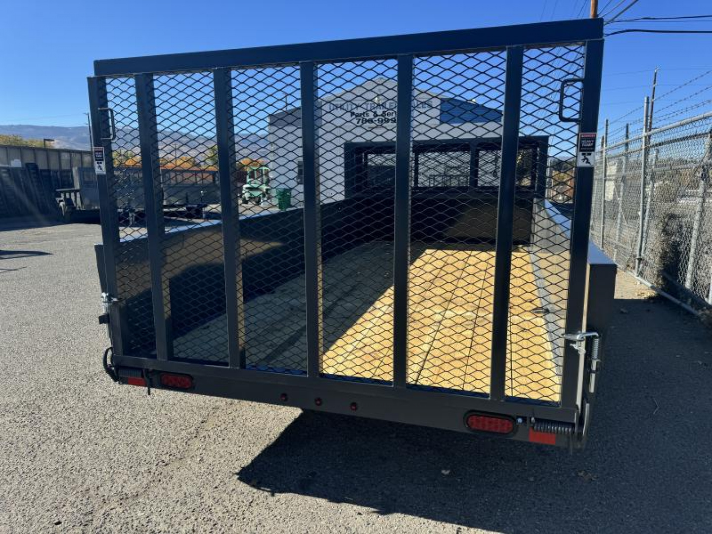 New 2025 Lamar 77" X 14' US - 7K Solid Side Landscape Utility Trailer