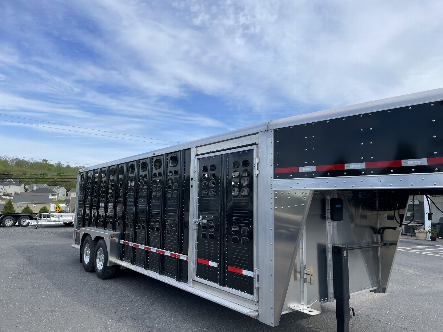 New 2025 Wilson 7x24x6'8" Stock Trailer