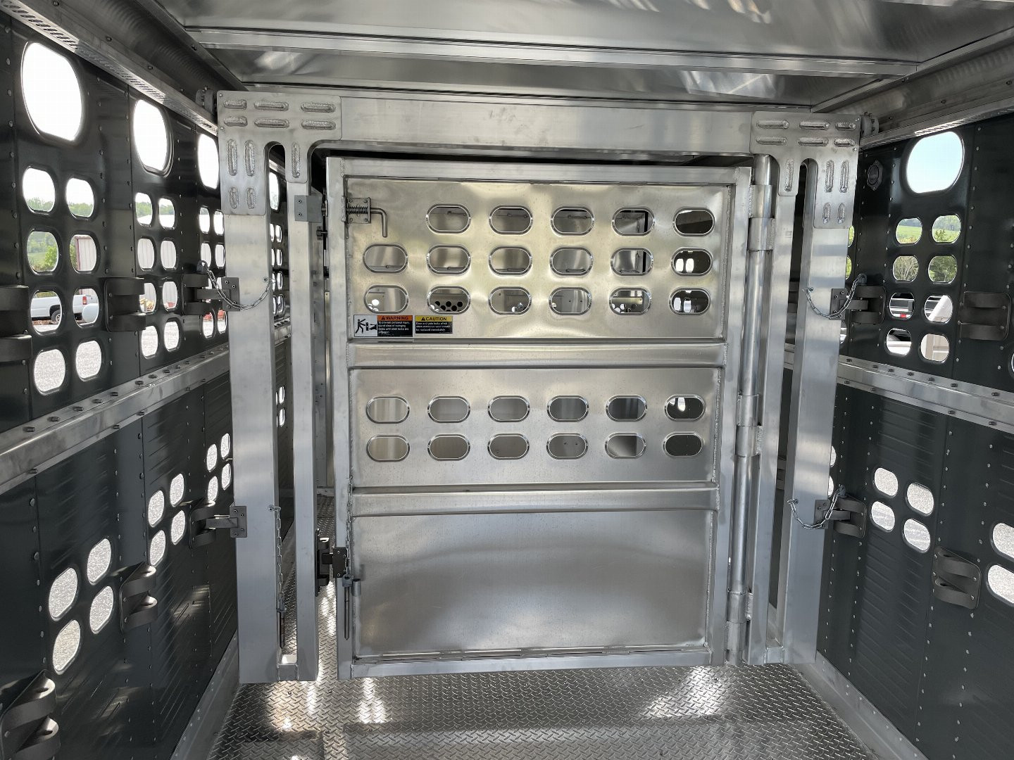 New 2025 Wilson 7x24x6'8" Stock Trailer