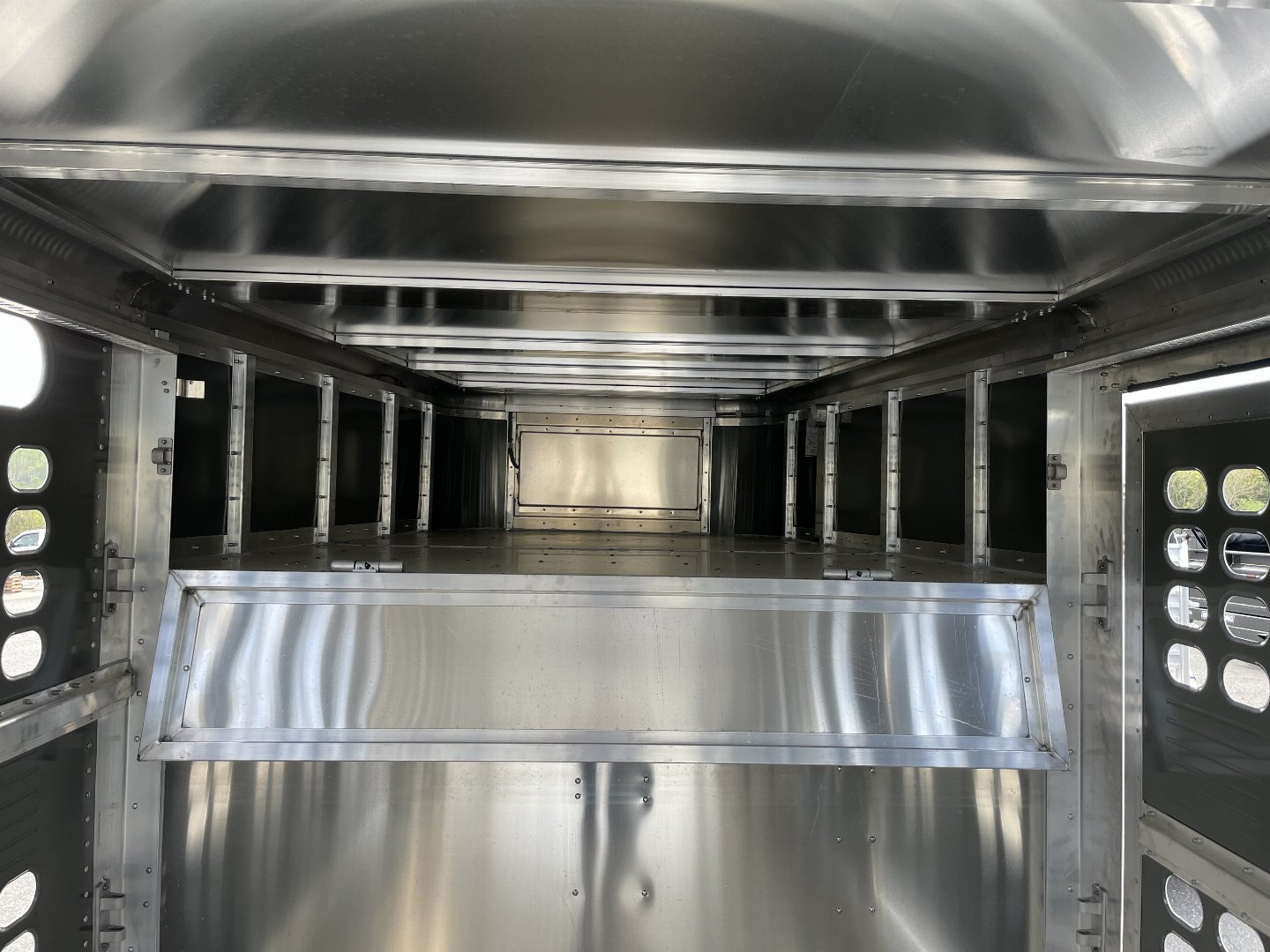 New 2025 Wilson 7x24x6'8" Stock Trailer