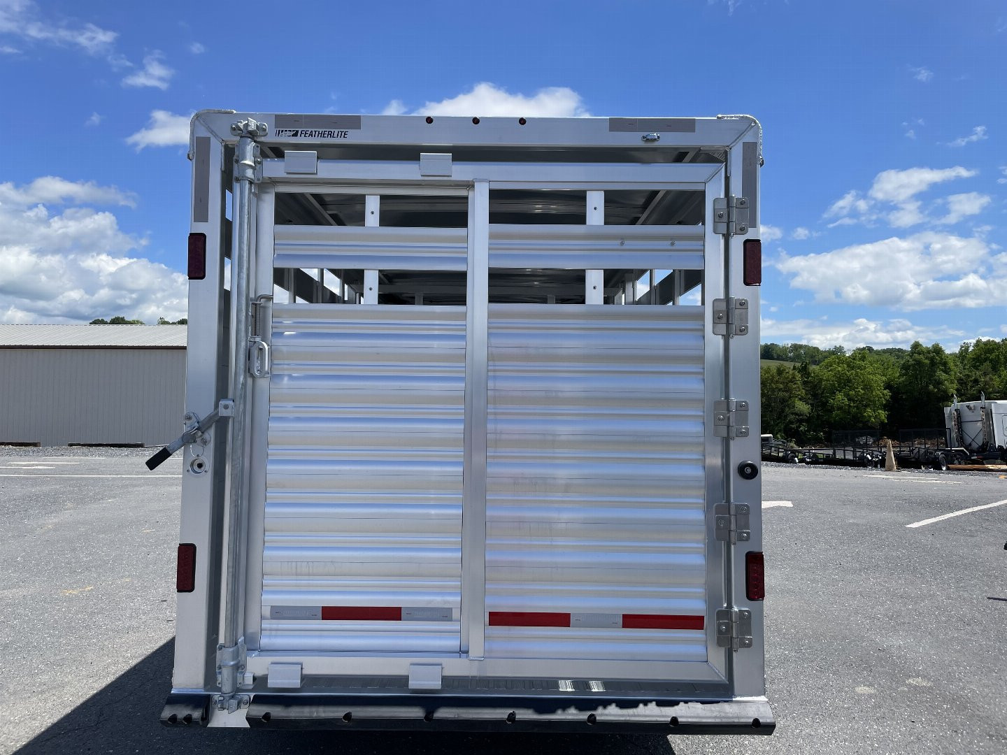 New Featherlite 8107-6'7"x16'x6'6" Aluminum Bumper Pull Stock Trailer