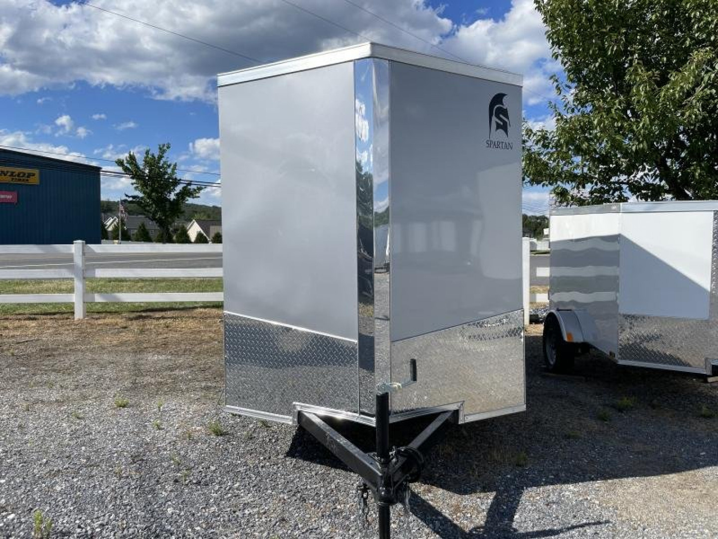 New 2026 Spartan Cargo 6x12X6'3" Rear Ramp Door Enclosed Trailer