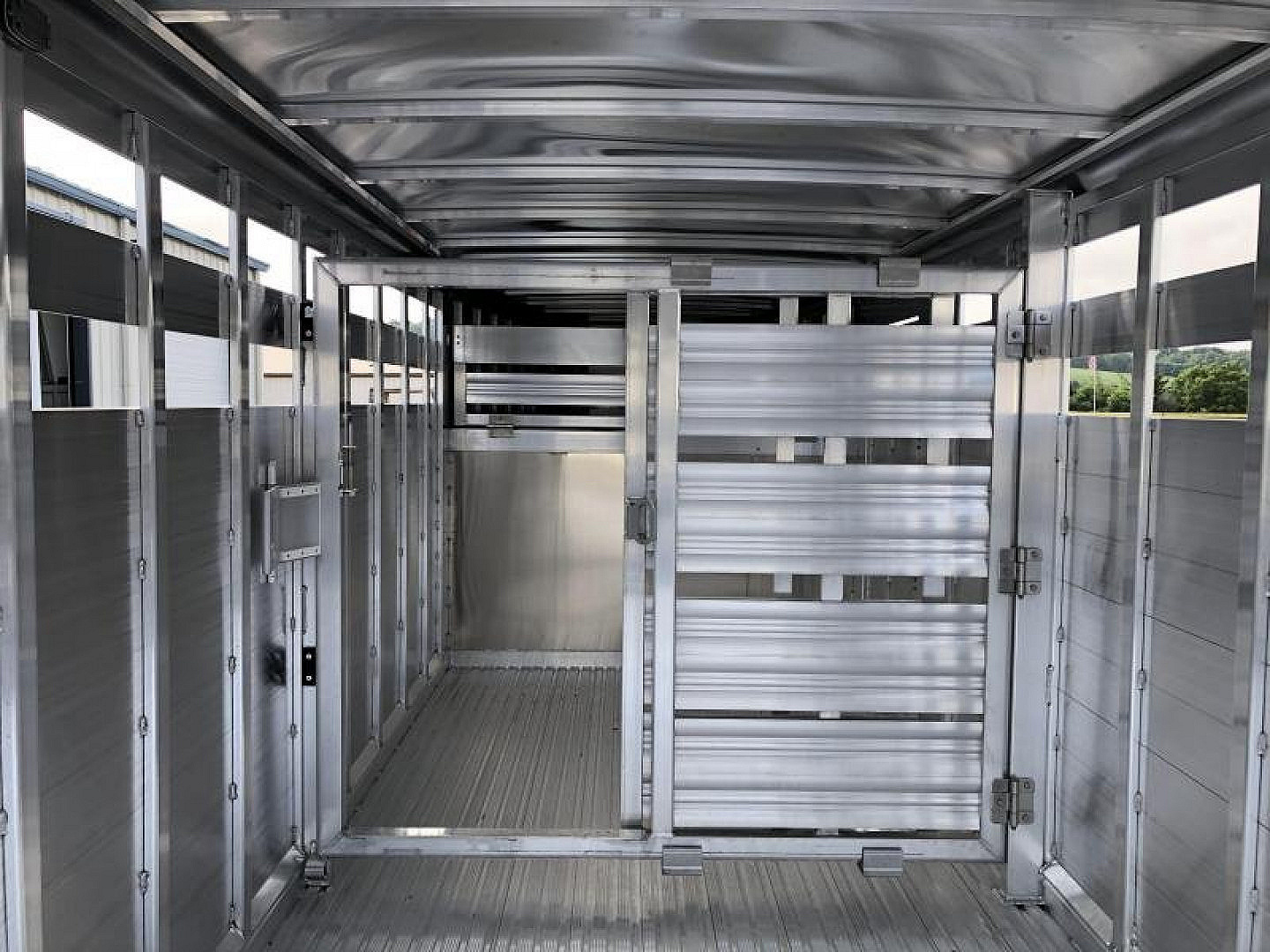 New 2026 Featherlite 7'x24'x6'6" Stock Trailer