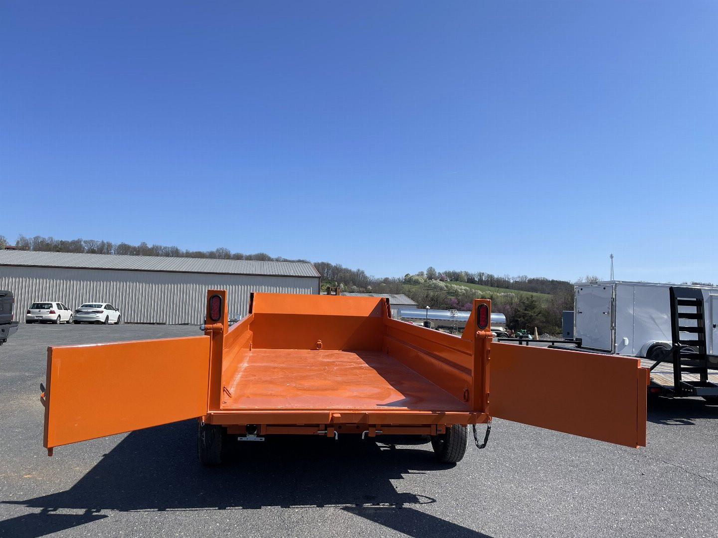 New 2025 Sure-Trac 6X12 Orange Dump Trailer