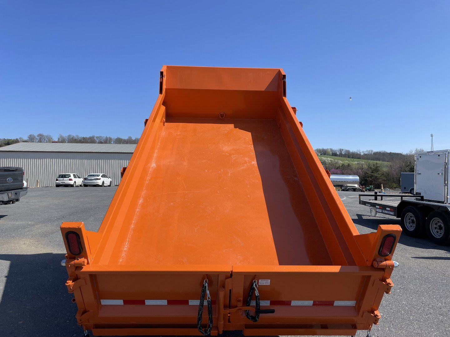 New 2025 Sure-Trac 6X12 Orange Dump Trailer