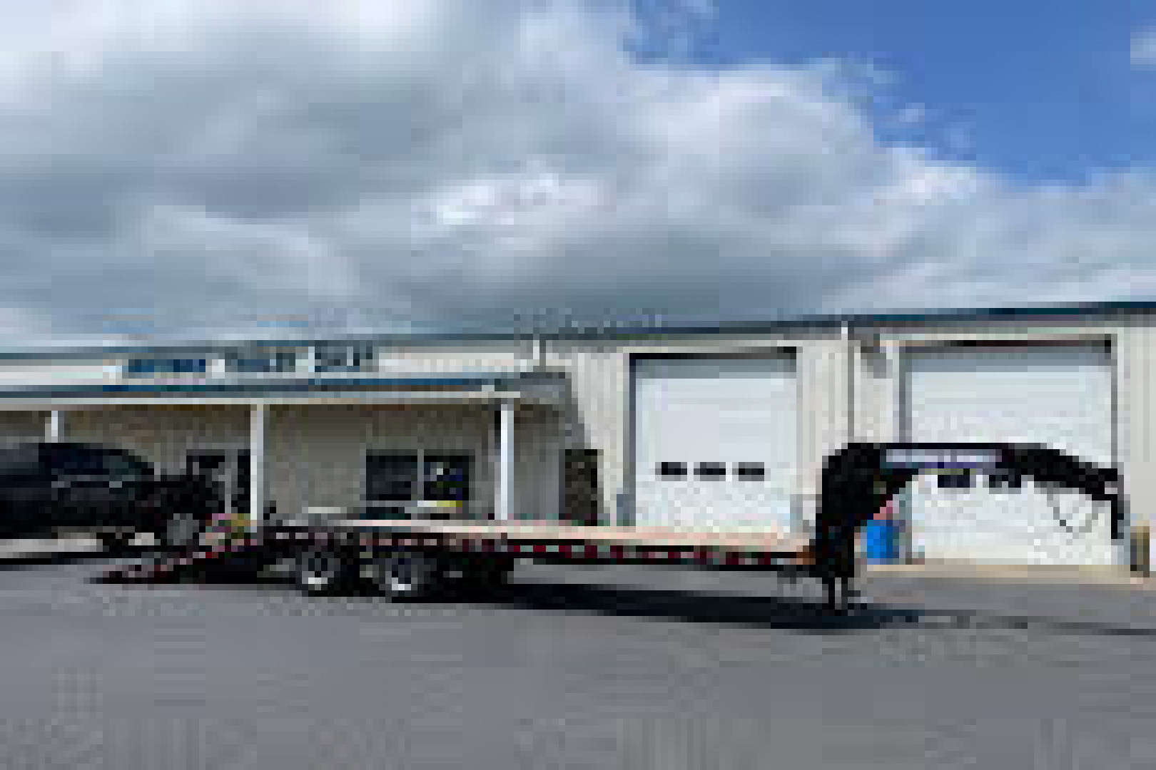 New 2025 Sure-Trac 102"X22+10 Hydraulic Tail 25.9K Equipment Trailer