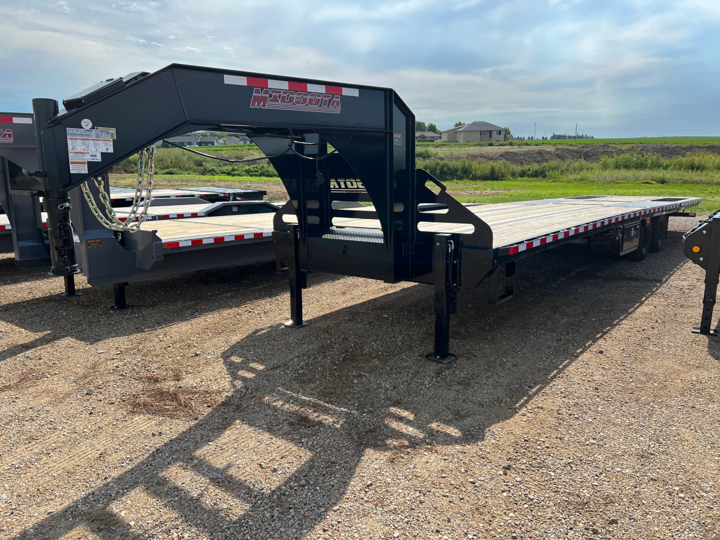 New 2025 Midsota 36' Gooseneck Hydraulic Tail Flatbed Trailer