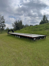 Used 2023 Canada Trailers USED-102''X 44' LOW-PRO GOOSE W/Slide in Ramps 21000LB GVW Flatbed Trailer