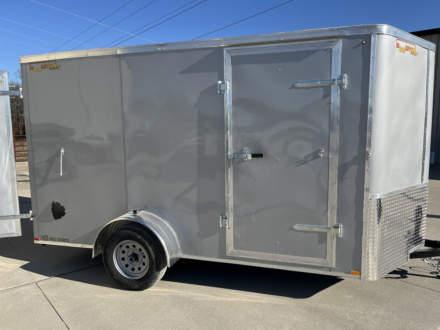 New 2024 DOOLITTLE 6 x 12 SILVER FROST RAISED ROOF Cargo / Enclosed Trailer