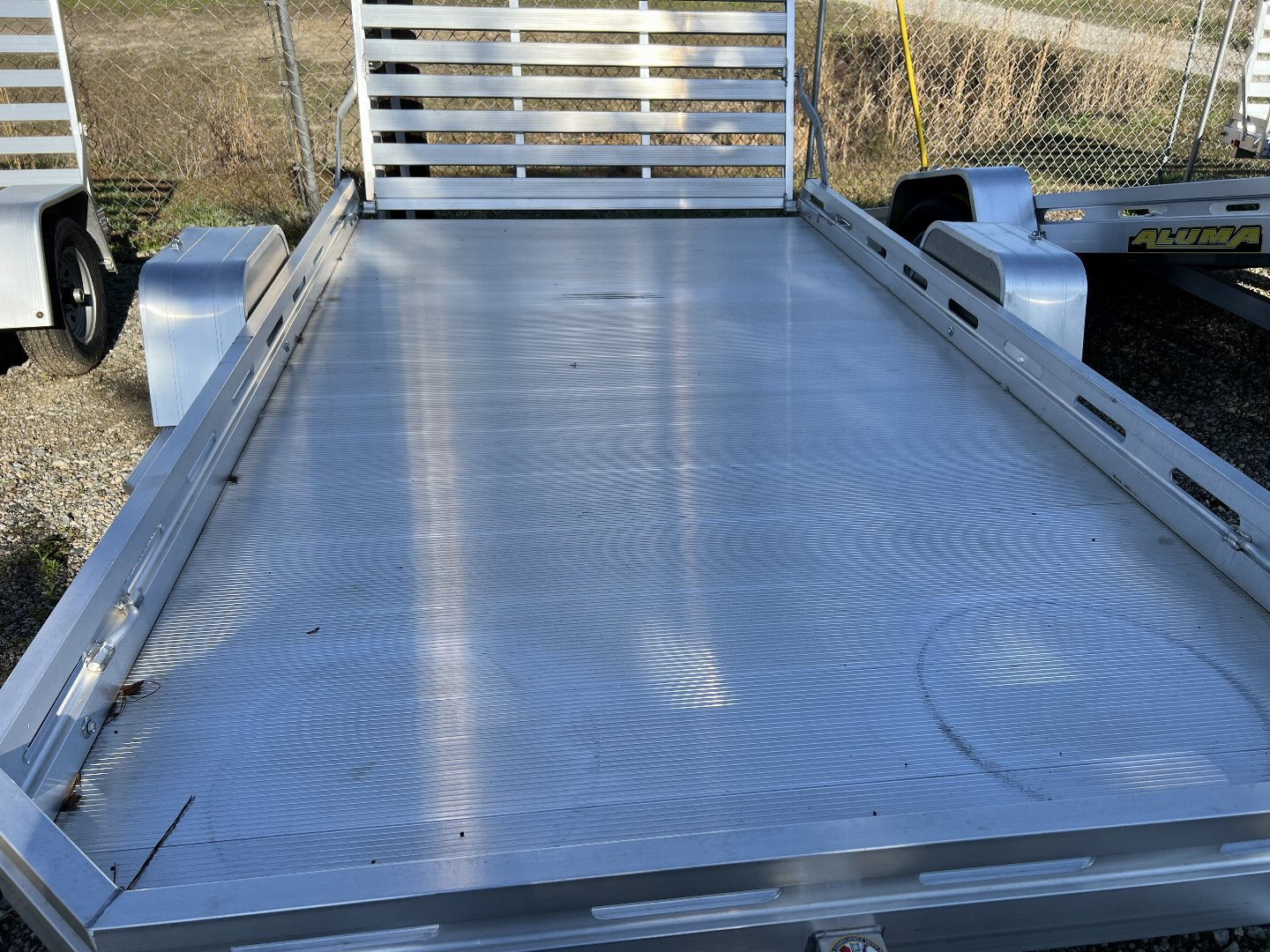 New 2025 Aluma EX7712H Utility Trailer