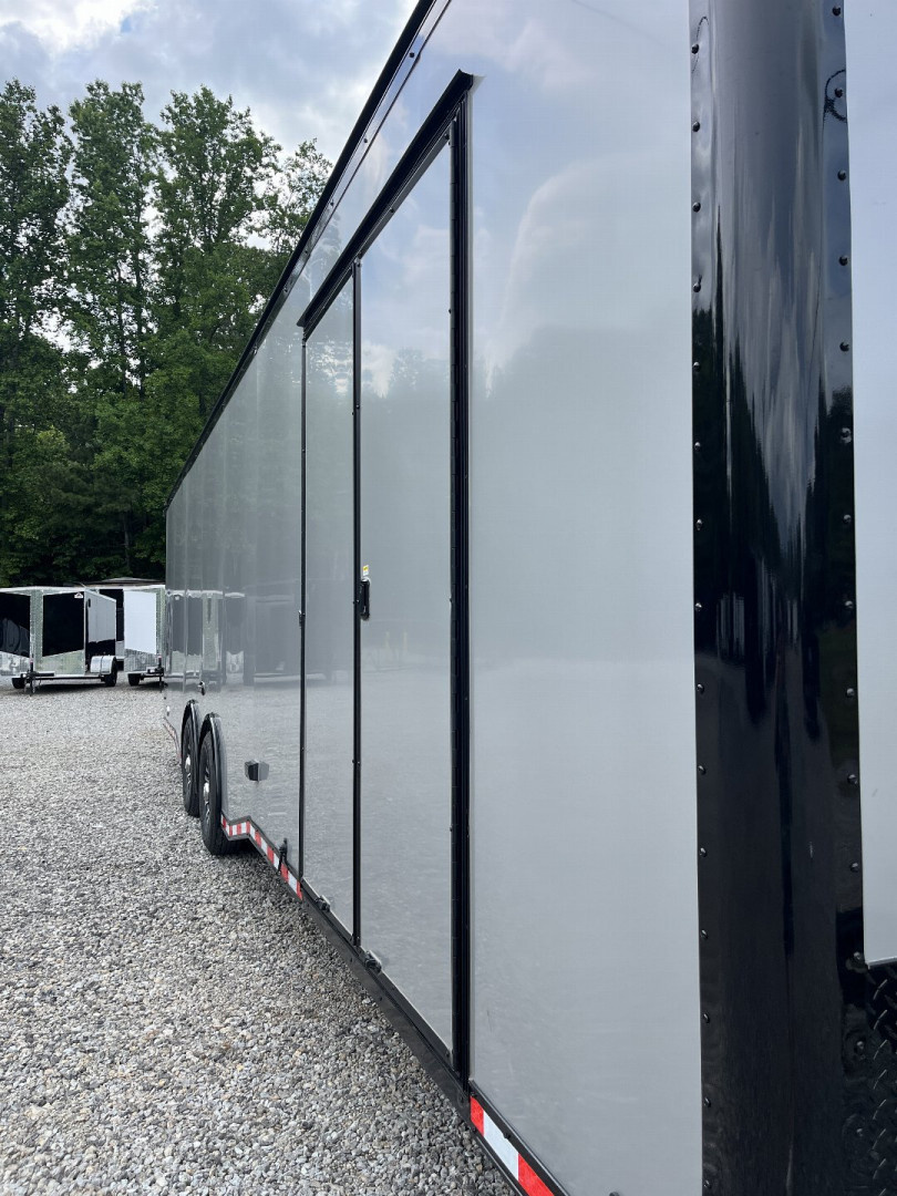 New 2026 HAULMARK 32' EDGE RACE TRAILER, SPORTSMAN PLUS PKG, SILVER POLYCOR WITH BLACK TRIM, 14K GVWR, 96" WIDE REAR DOOR OPENING, 7'4" INTERIOR HEIGHT