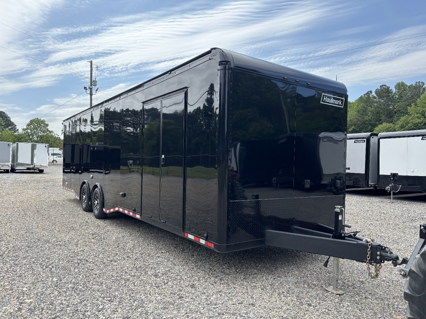 New 2025 Haulmark 32 EDGE Race Trailer, Sportsman Plus PKG, Black PolyCor With Black Trim, 14K GVWR, 96" Wide Rear Door Opening, 7'4" Interior Height