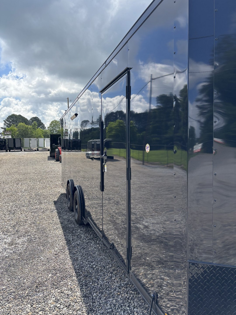 New 2025 Spartan Cargo 8.5x24 Custom Trailer, Black PolyCor With Black Trim, Rubber Coin PKG, 10K Torsion Spread Axles, E-Track, Cabinets