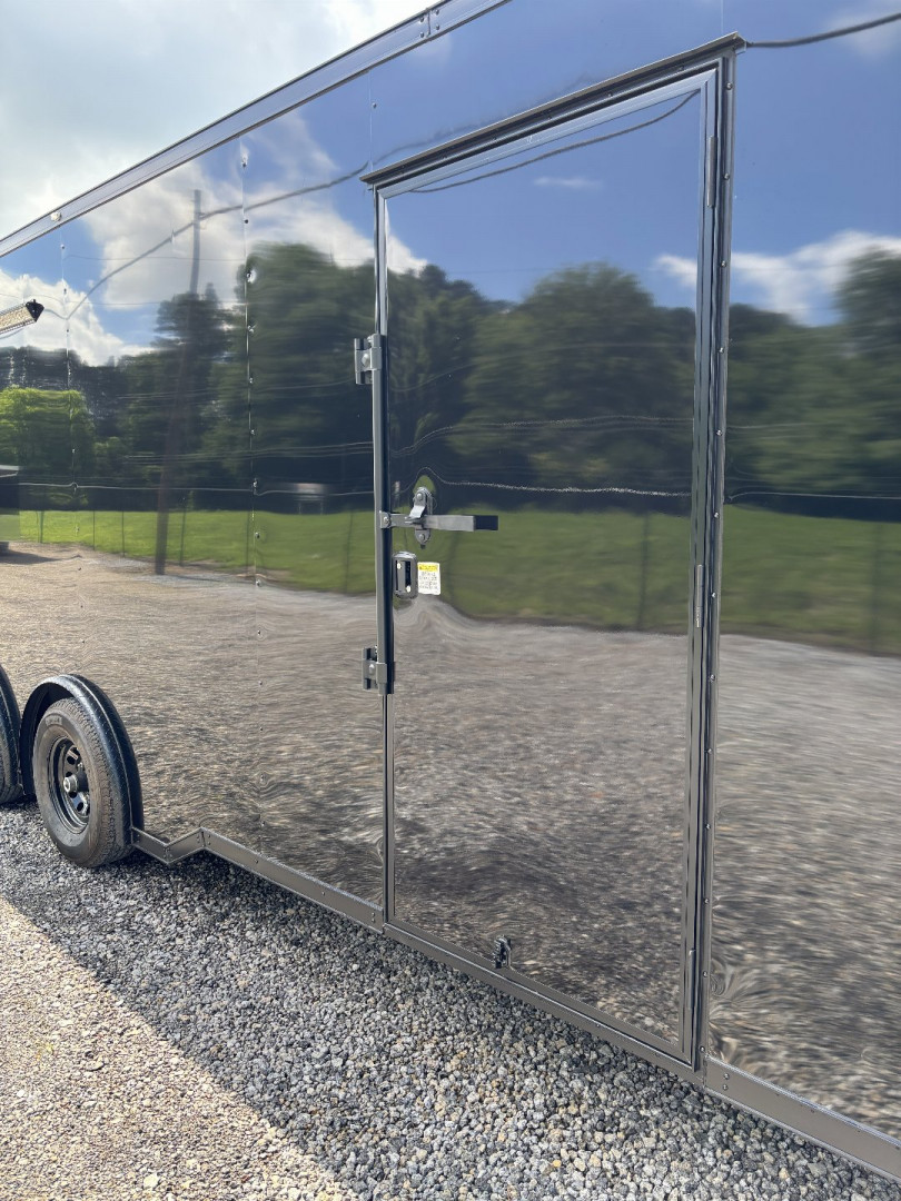 New 2025 Spartan Cargo 8.5x24 Custom Trailer, Black PolyCor With Black Trim, Rubber Coin PKG, 10K Torsion Spread Axles, E-Track, Cabinets