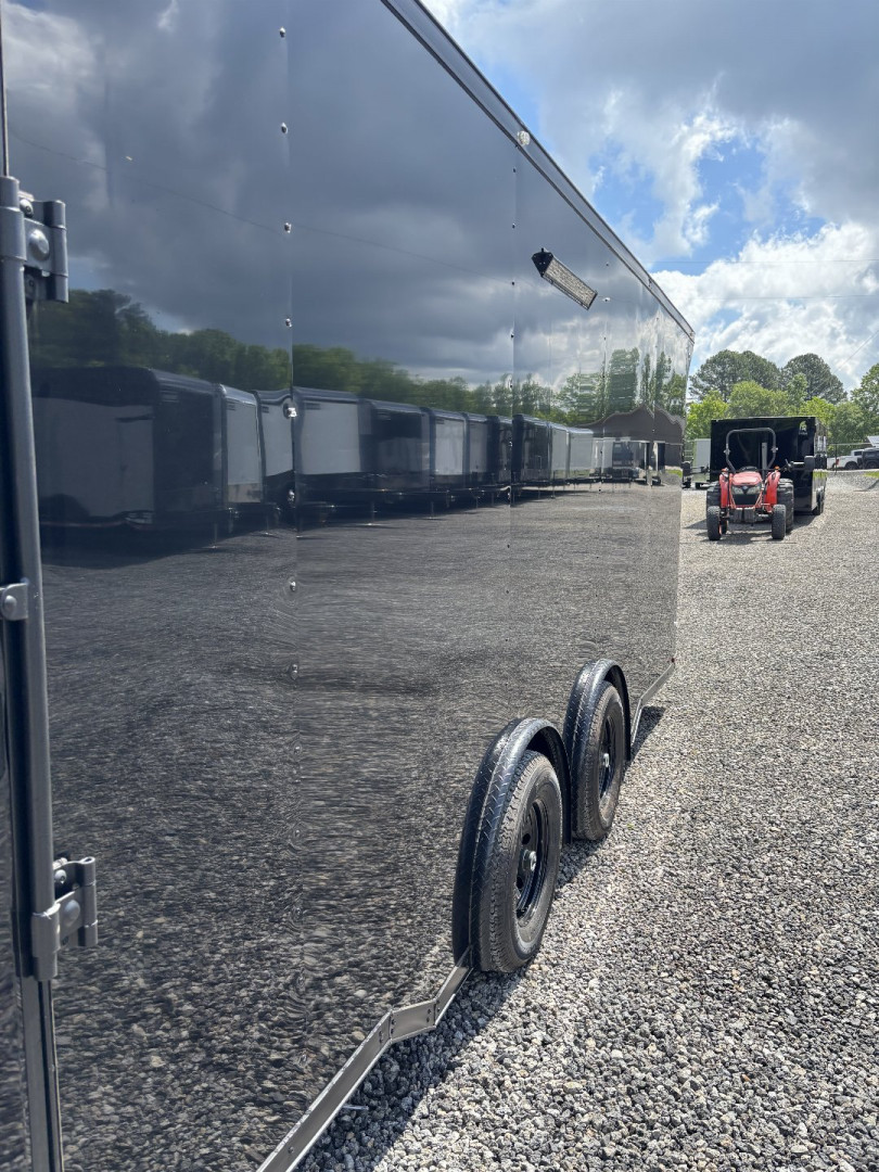 New 2025 Spartan Cargo 8.5x24 Custom Trailer, Black PolyCor With Black Trim, Rubber Coin PKG, 10K Torsion Spread Axles, E-Track, Cabinets