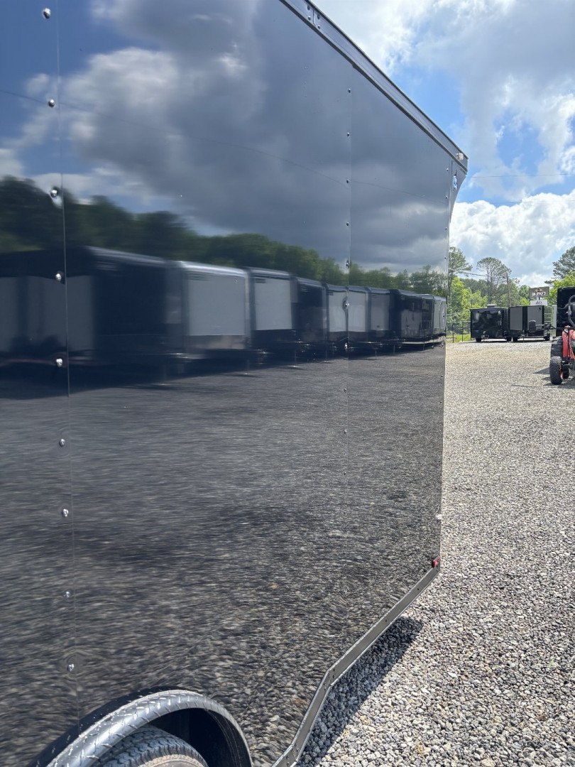 New 2025 Spartan Cargo 8.5x24 Custom Trailer, Black PolyCor With Black Trim, Rubber Coin PKG, 10K Torsion Spread Axles, E-Track, Cabinets