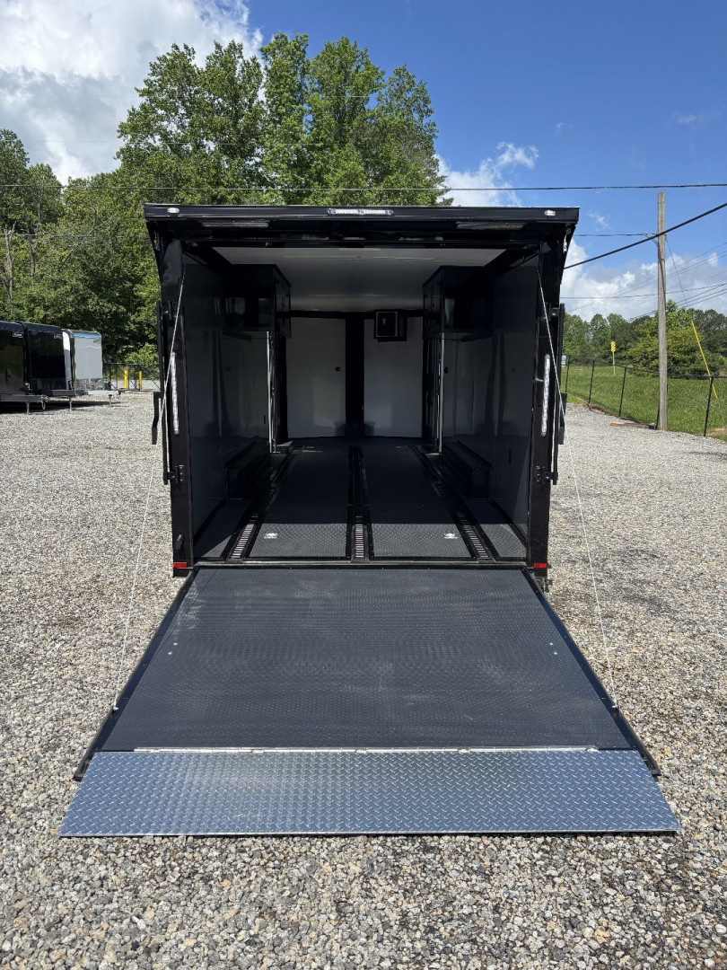 New 2025 Spartan Cargo 8.5x24 Custom Trailer, Black PolyCor With Black Trim, Rubber Coin PKG, 10K Torsion Spread Axles, E-Track, Cabinets