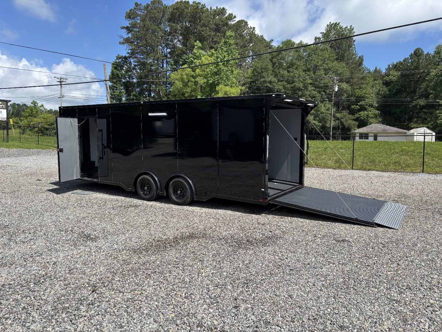 New 2025 Spartan Cargo 8.5x24 Custom Trailer, Black PolyCor With Black Trim, Rubber Coin PKG, 10K Torsion Spread Axles, E-Track, Cabinets