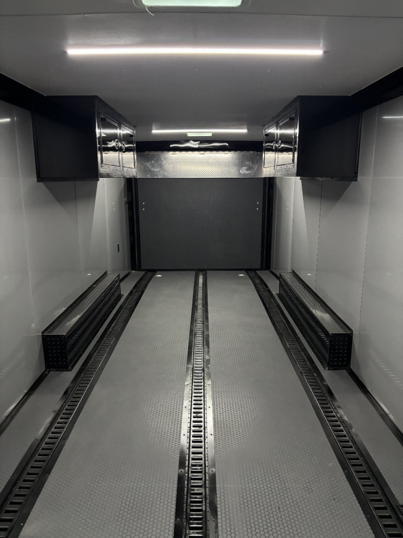 New 2025 Spartan Cargo 8.5x24 Custom Trailer, Black PolyCor With Black Trim, Rubber Coin PKG, 10K Torsion Spread Axles, E-Track, Cabinets