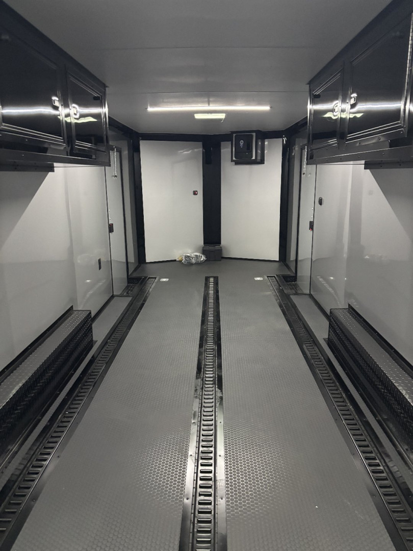 New 2025 Spartan Cargo 8.5x24 Custom Trailer, Black PolyCor With Black Trim, Rubber Coin PKG, 10K Torsion Spread Axles, E-Track, Cabinets