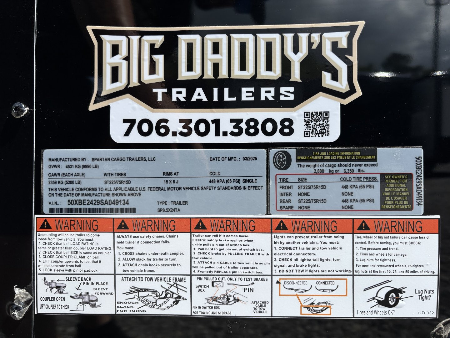 New 2025 Spartan Cargo 8.5x24 Custom Trailer, Black PolyCor With Black Trim, Rubber Coin PKG, 10K Torsion Spread Axles, E-Track, Cabinets
