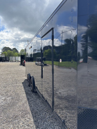 New 2025 Spartan Cargo 8.5x24 Custom Trailer, Black PolyCor With Black Trim, Rubber Coin PKG, 10K Torsion Spread Axles, E-Track, Cabinets