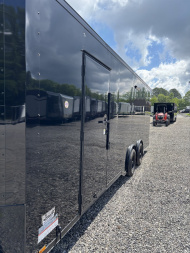 New 2025 Spartan Cargo 8.5x24 Custom Trailer, Black PolyCor With Black Trim, Rubber Coin PKG, 10K Torsion Spread Axles, E-Track, Cabinets