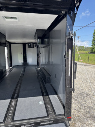 New 2025 Spartan Cargo 8.5x24 Custom Trailer, Black PolyCor With Black Trim, Rubber Coin PKG, 10K Torsion Spread Axles, E-Track, Cabinets