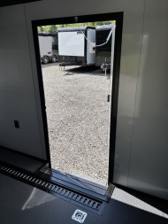 New 2025 Spartan Cargo 8.5x24 Custom Trailer, Black PolyCor With Black Trim, Rubber Coin PKG, 10K Torsion Spread Axles, E-Track, Cabinets