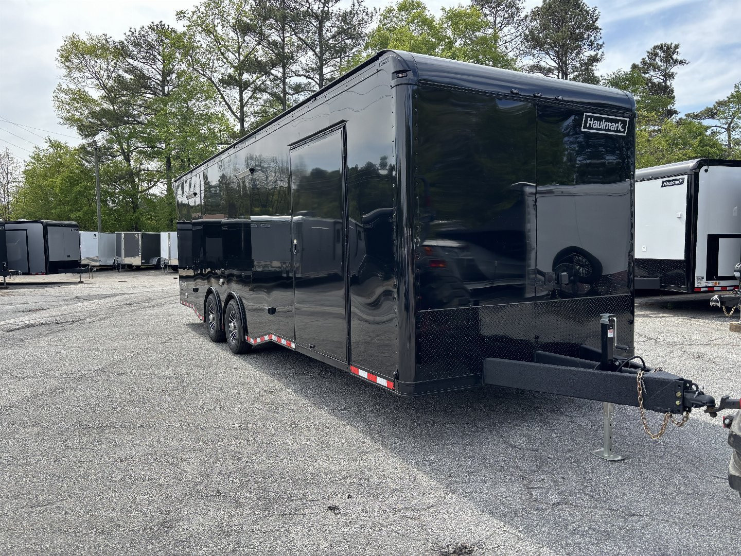 New 2025 Haulmark 28 EDGE Race Trailer, ProStock PKG, Black PolyCor, Black Interior, 14K GVWR, 7'4" Interior, Landing Light PKG, Fully Undercoated Frame