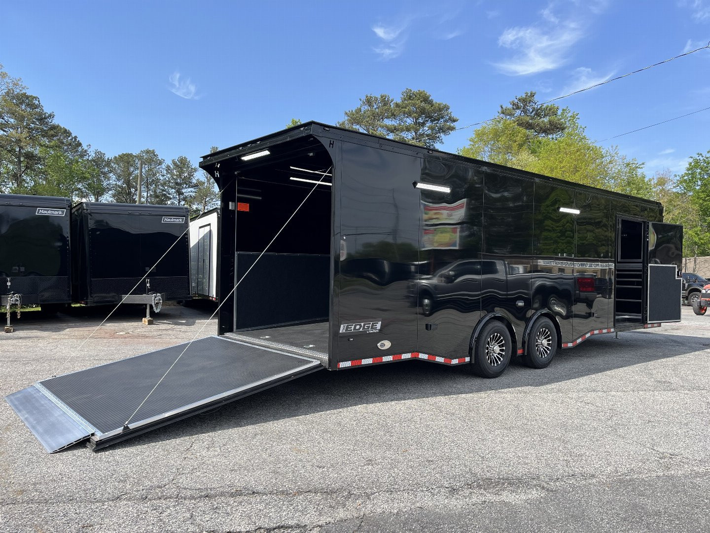 New 2025 Haulmark 28 EDGE Race Trailer, ProStock PKG, Black PolyCor, Black Interior, 14K GVWR, 7'4" Interior, Landing Light PKG, Fully Undercoated Frame