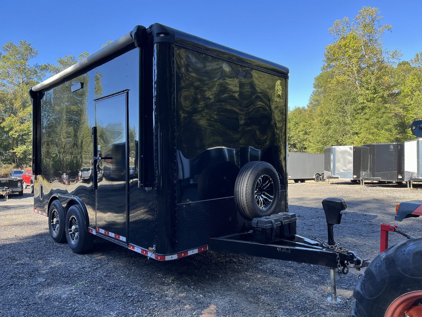 Used 2024 Spartan 8.5x16 Custom Enclosed Trailer, Black PolyCor, 8' Interior, Custom Shelves, E-Track, Flat Front With Cast Upper Corners, 14K GVWR, HD, Awning