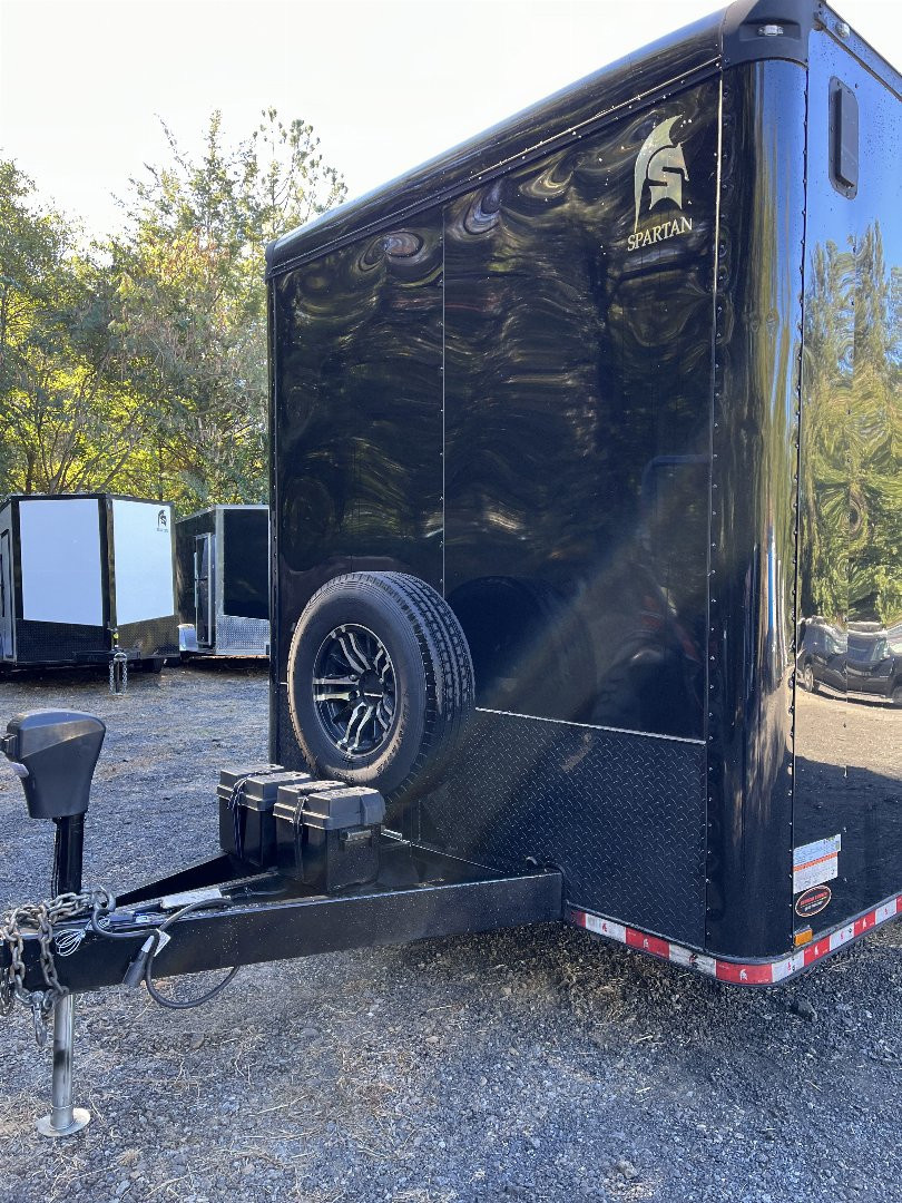 Used 2024 Spartan 8.5x16 Custom Enclosed Trailer, Black PolyCor, 8' Interior, Custom Shelves, E-Track, Flat Front With Cast Upper Corners, 14K GVWR, HD, Awning