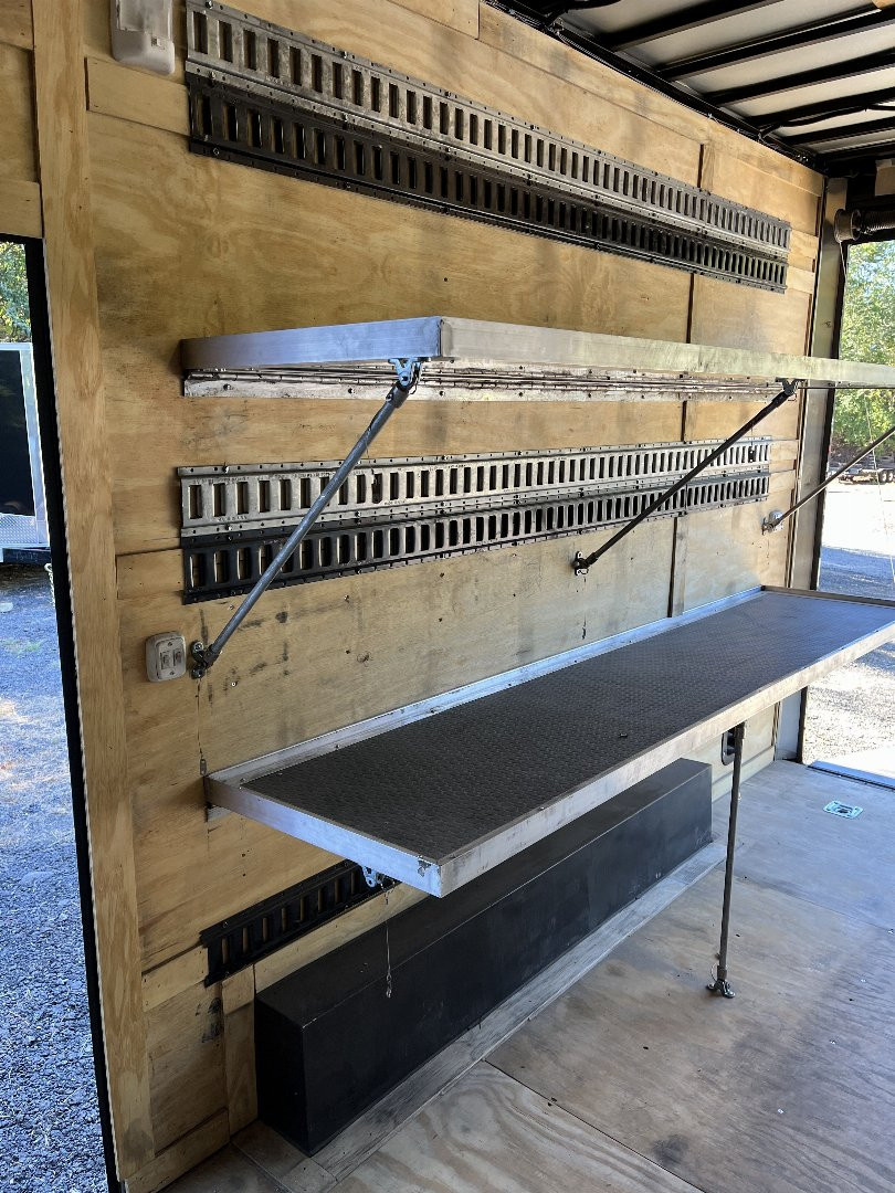 Used 2024 Spartan 8.5x16 Custom Enclosed Trailer, Black PolyCor, 8' Interior, Custom Shelves, E-Track, Flat Front With Cast Upper Corners, 14K GVWR, HD, Awning