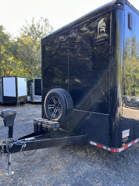 Used 2024 Spartan 8.5x16 Custom Enclosed Trailer, Black PolyCor, 8' Interior, Custom Shelves, E-Track, Flat Front With Cast Upper Corners, 14K GVWR, HD, Awning
