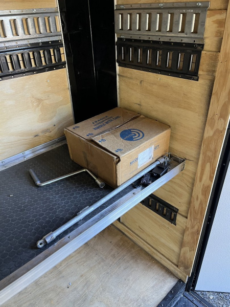 Used 2024 Spartan 8.5x16 Custom Enclosed Trailer, Black PolyCor, 8' Interior, Custom Shelves, E-Track, Flat Front With Cast Upper Corners, 14K GVWR, HD, Awning