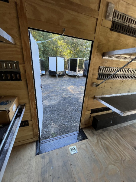 Used 2024 Spartan 8.5x16 Custom Enclosed Trailer, Black PolyCor, 8' Interior, Custom Shelves, E-Track, Flat Front With Cast Upper Corners, 14K GVWR, HD, Awning