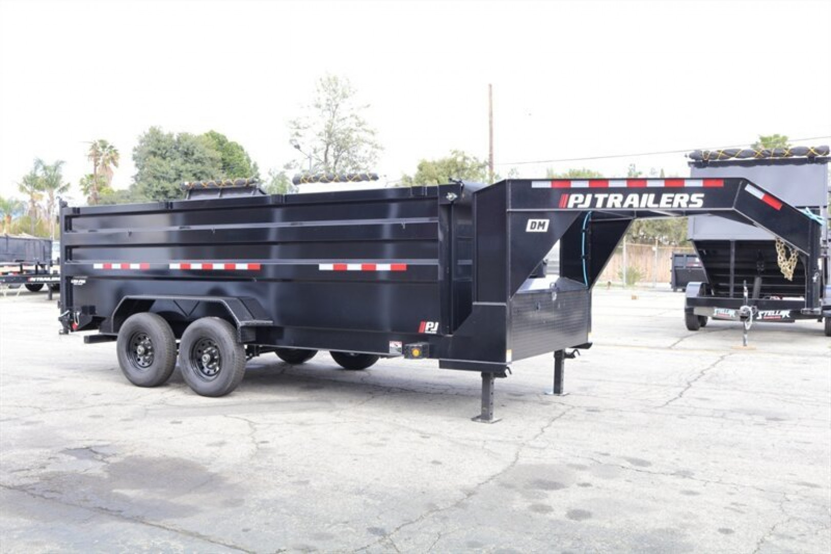 New 2025 PJ Trailers DM162 Dump Trailer