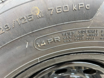 New 2025 Caliber Trailer Mfg 7x14x4 14K Tandem Dump Black