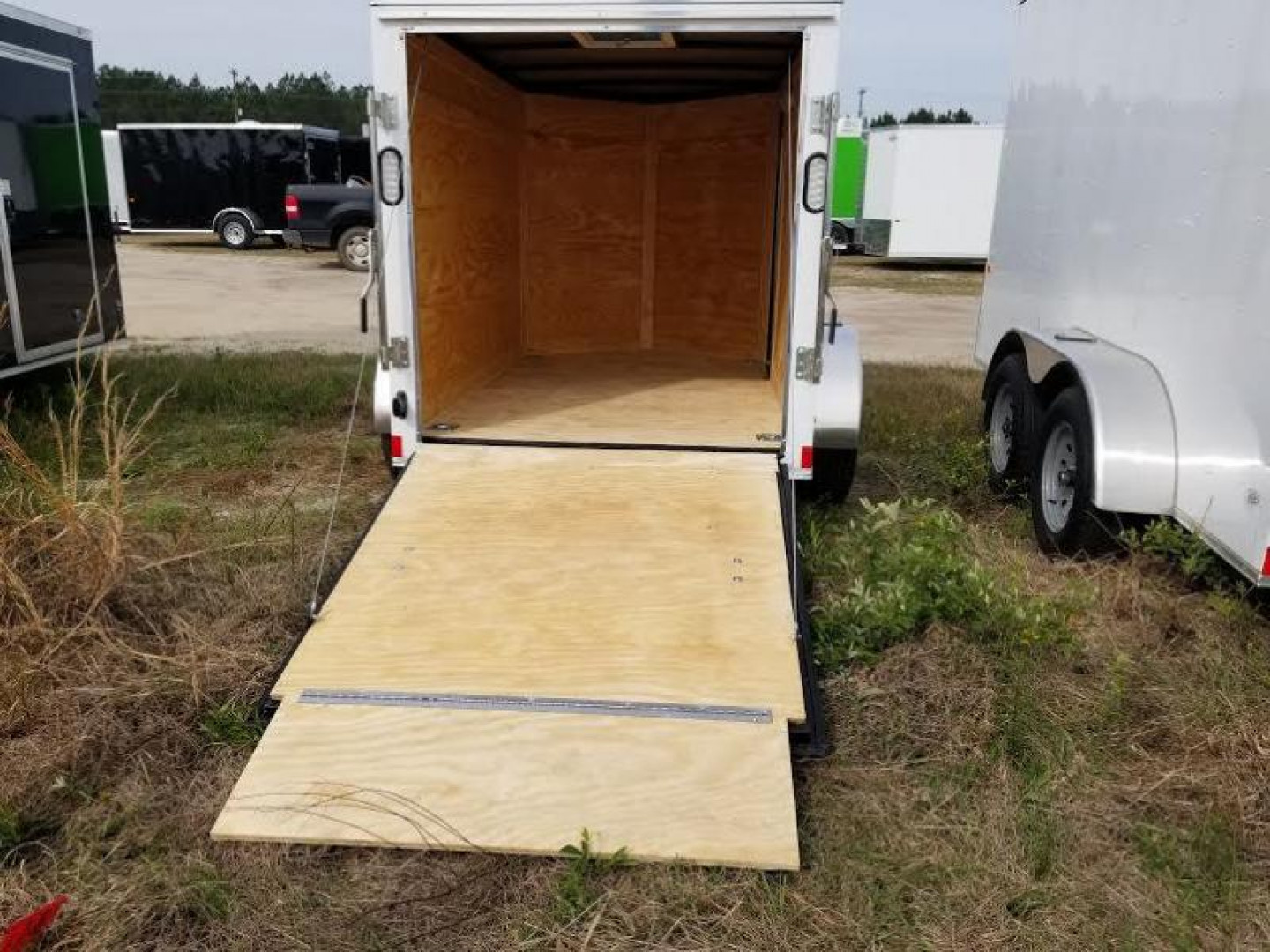 New 5x8 Enclosed Cargo Trailer. Buy an enclosed trailer to keep your tools out of the weather!