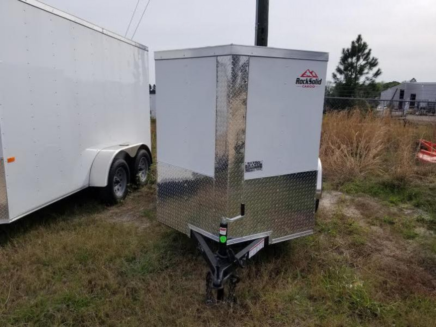 New 5x8 Enclosed Cargo Trailer. Buy an enclosed trailer to keep your tools out of the weather!
