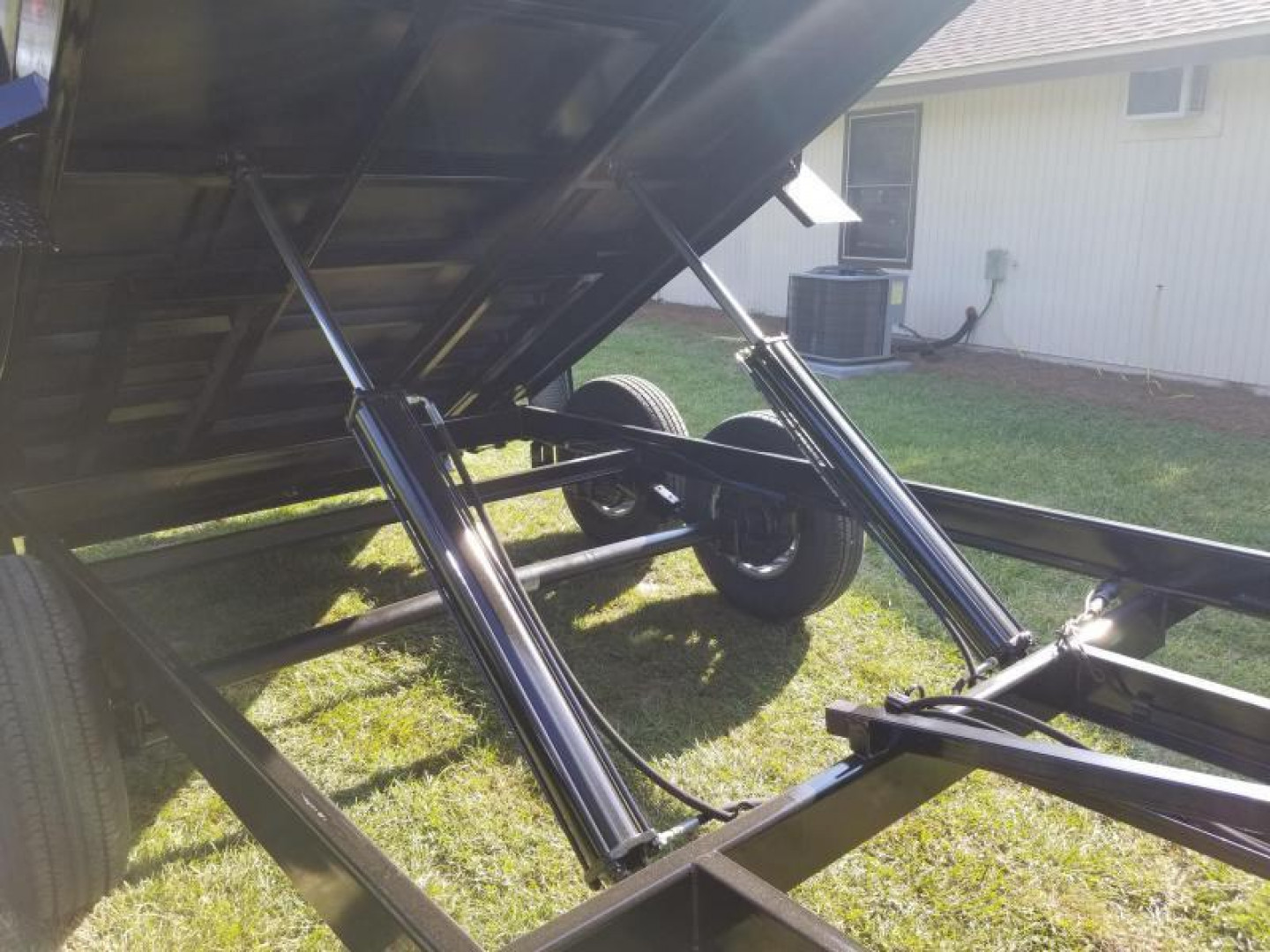 New 7x14 (4' sides) Down to Earth Dump Trailer