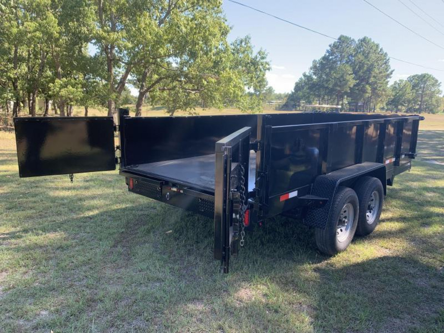 New 7x16 (2' sides) Down to Earth Dump Trailer