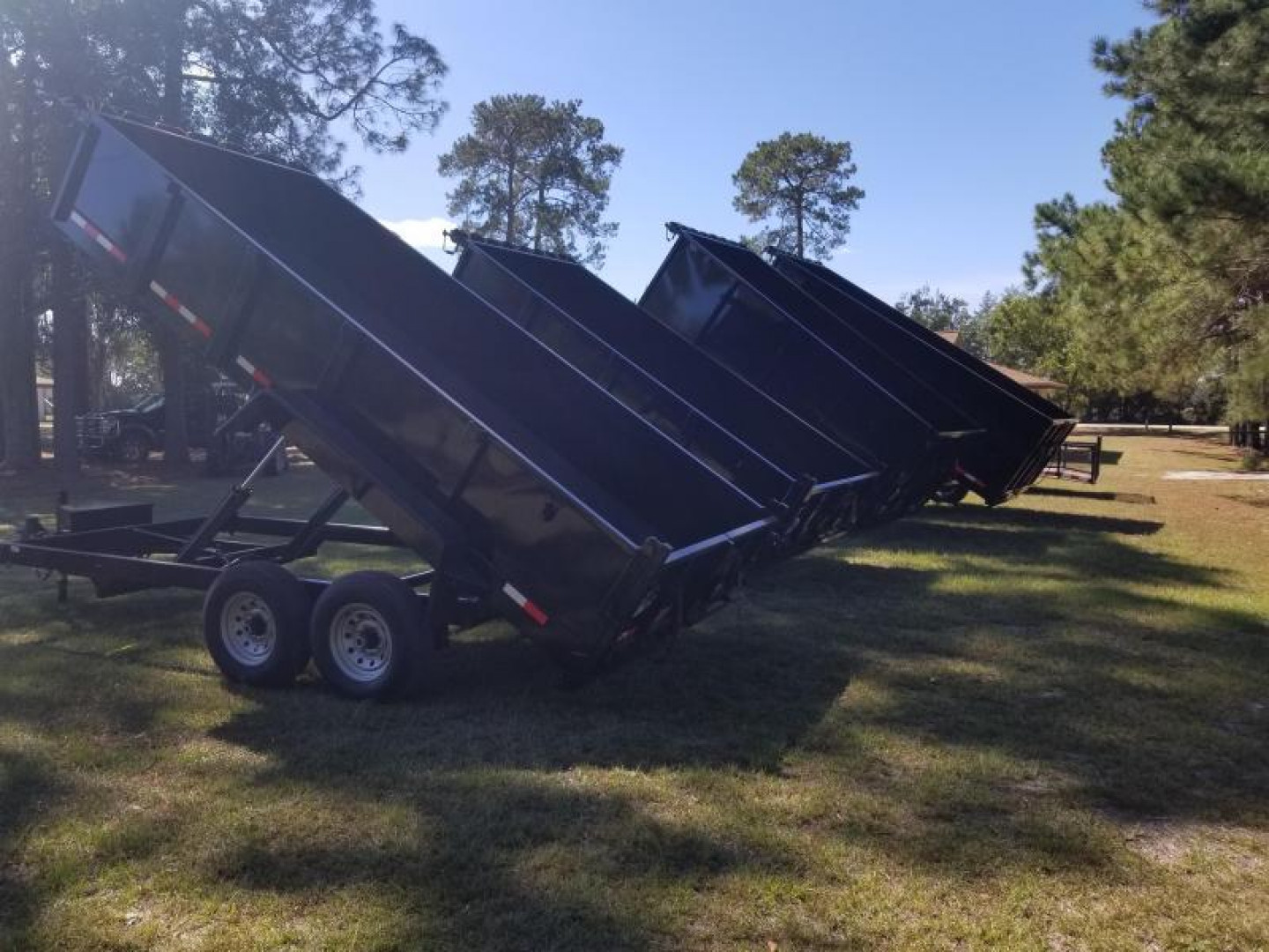 New 7x16 (2' sides) Down to Earth Dump Trailer