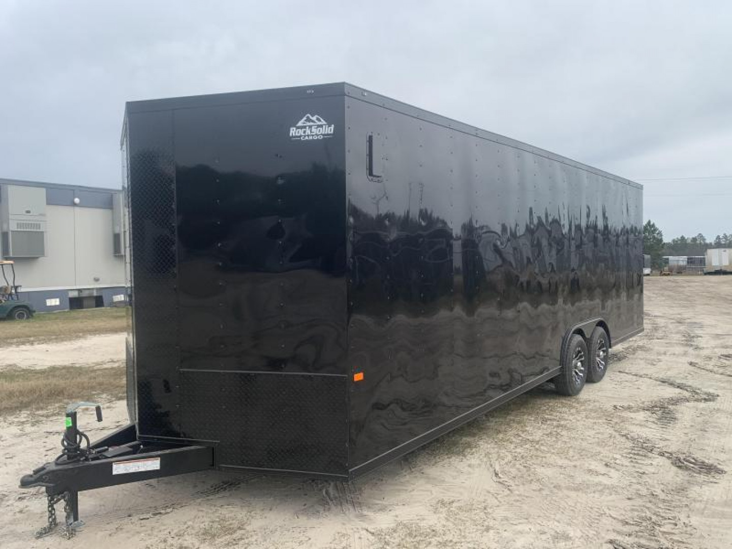 New 8.5x24-5200lb- 7'- Blackout Elite Rock Solid Cargo Trailer